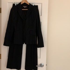 Woman’s pinstriped suit